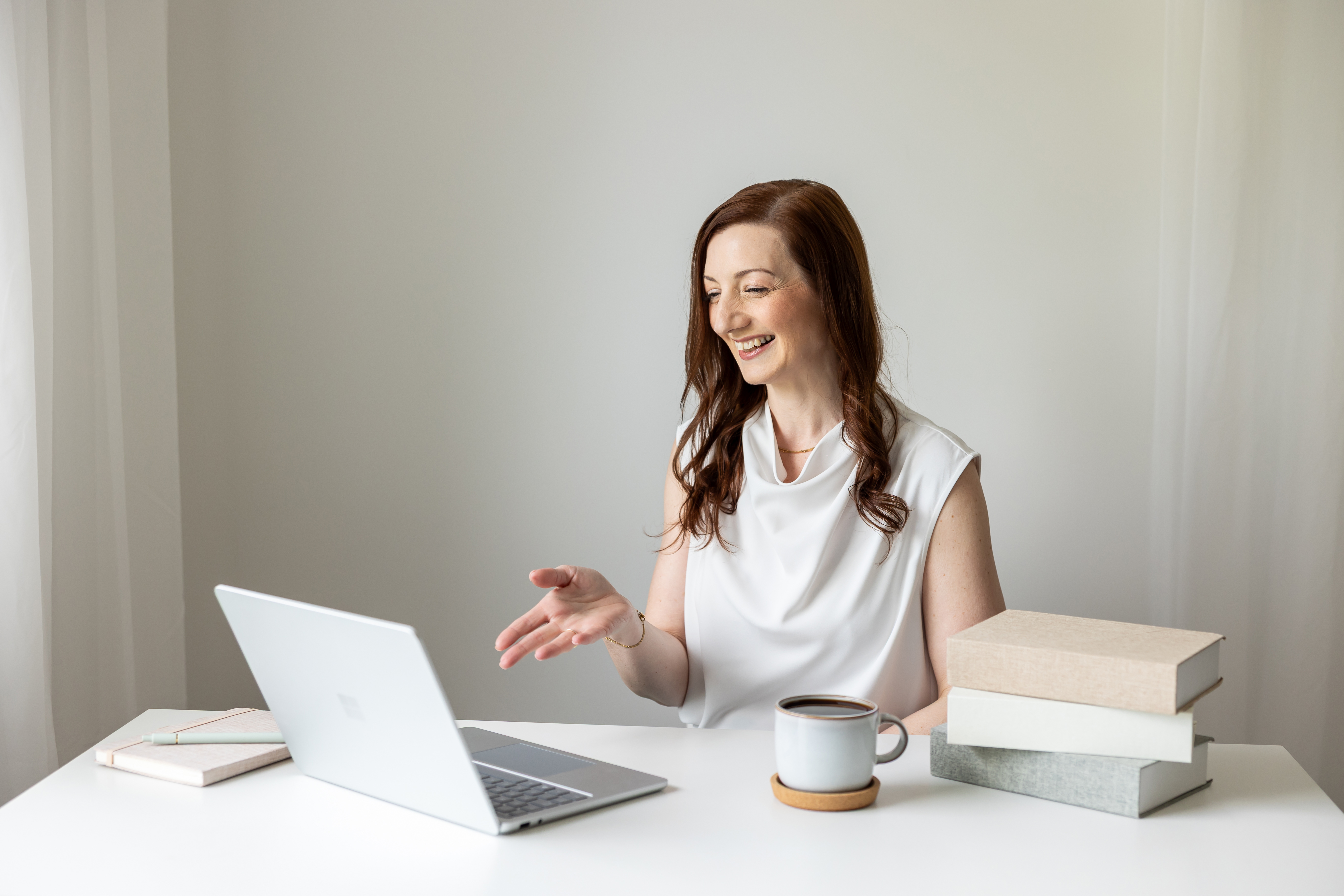 A Thrive Collective member working at a laptop